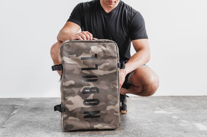 HH04B452 duffleback en toile cirée Nobull unisexe